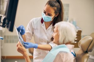 Dental Bridge vs Implant for Seniors in Portland